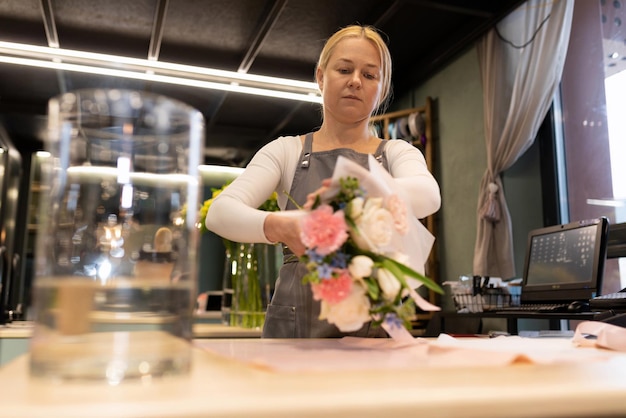 Cutting flowers and creating a chic bouquet from them