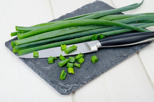 Cutting stalks of green onions