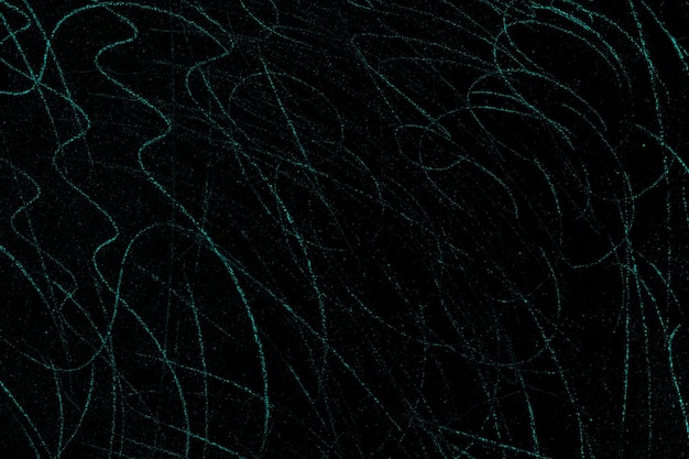 Cyan color random scratches on the black concrete wall surface for background