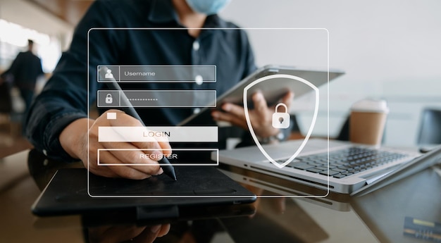 Cyber security concept Login User identification information security and encryption secure access to user's personal information woman using smart phone and tablet in officexA