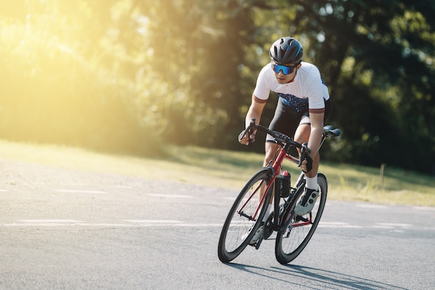 Cyclist pedaling on a racing bike outdoors