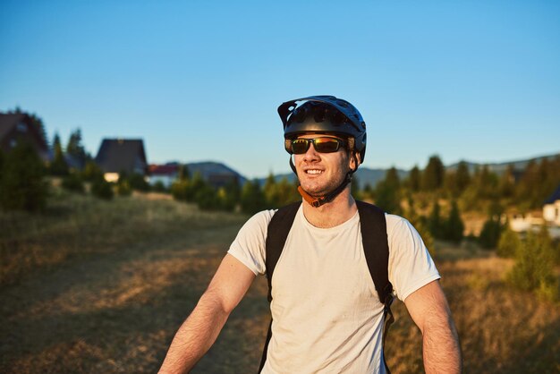 Cyclist Riding the Bike on the Trail in the Forest Man cycling on enduro trail track Sport fitness motivation and inspiration Extreme Sport Concept Selective focus