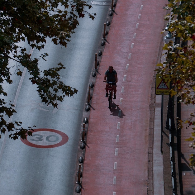 cyclist on the street, bicycle mode of transportation in Bilbao city, spain