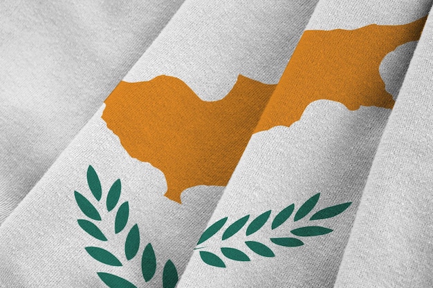 Cyprus flag with big folds waving close up under the studio light indoors The official symbols and colors in banner