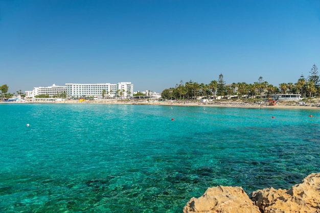 CYPRUS NISSI BEACH Tourists relax and swim on one of the most popular beaches on the island