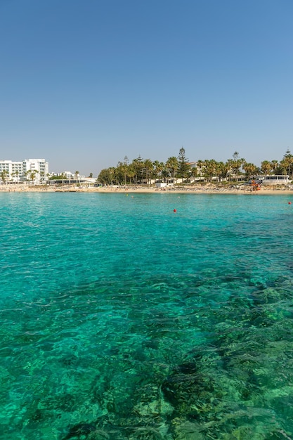 CYPRUS NISSI BEACH. Tourists relax and swim on one of the most popular beaches on the island