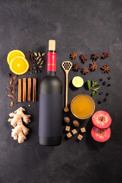 Ð¡hristmas or winter warming drink. .Mulled wine recipe ingredients on black chalkboard