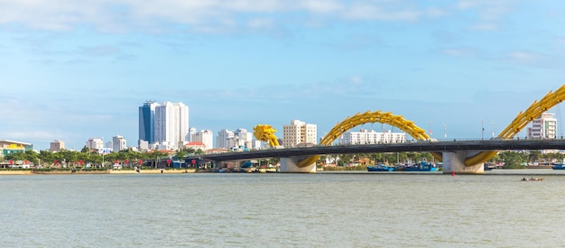 Da nang city panorama with skyscrapers and beautiful architecture bridges along han river on a