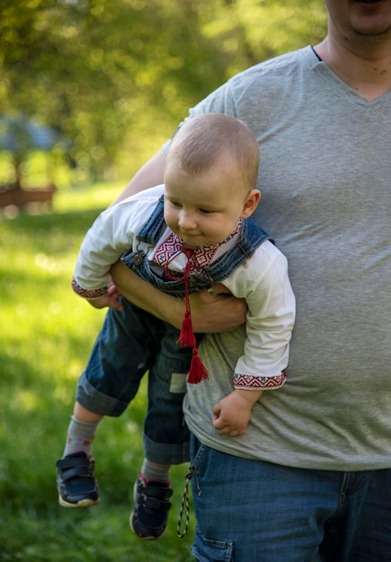 Dad and baby son in the park