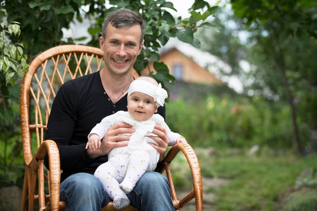 Dad with a small child Father with a newborn daughter