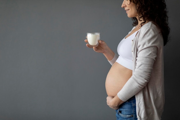 Dairy Foods During Pregnancy Young Pregnant Woman Holding Glass Of Milk