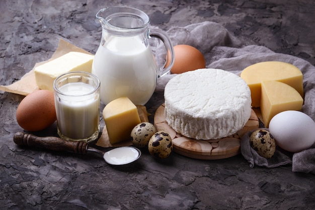 Dairy products. Milk, cottage cheese, sour cream, butter, eggs. Selective focus