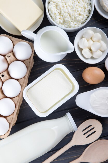 Dairy products on wooden table.