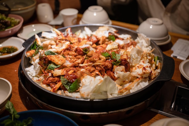 Dakgalbi barbeque chicken with vegetable mixed in hot pan