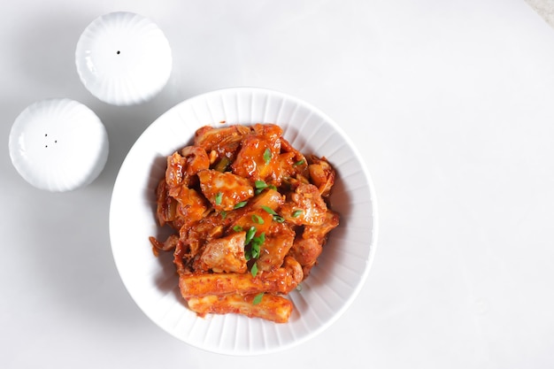 Dakgalbi or Dak Galbi is Korean spicy chicken stir fry.