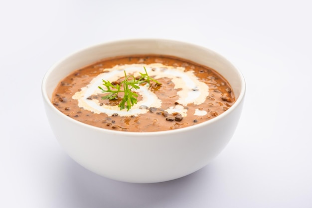 Dal makhani or dal makhni is a north Indian recipe, served in bowl, selective focus