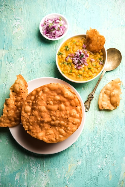 Dal pakwan is an authentic Sindhi breakfast. It is a combination of deepfried, crisp and unpuffed Maida puris served with Daal made using chana or split chickpea.