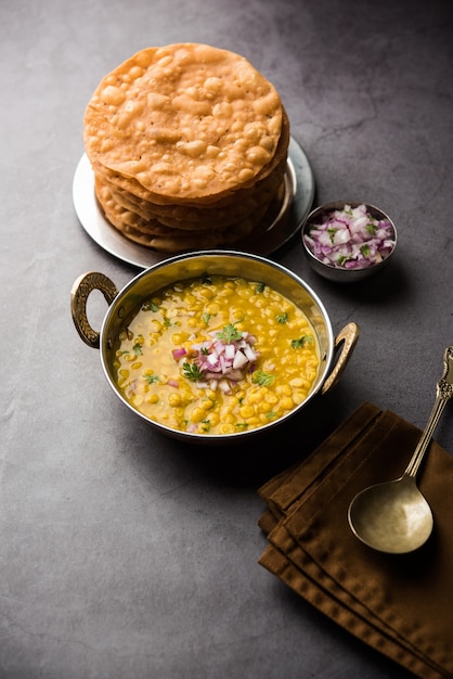 Dal pakwan is an authentic Sindhi breakfast. It is a combination of deepfried, crisp and unpuffed Maida puris served with Daal made using chana or split chickpea.