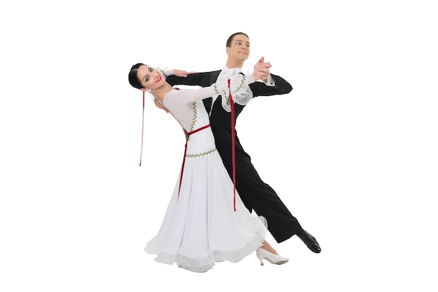 Dance ballroom couple in a dance pose isolated on white background. sensual professional dancers dancing walz, tango, slowfox and quickstep.