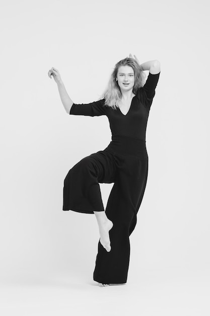 Dancing girl on a white background