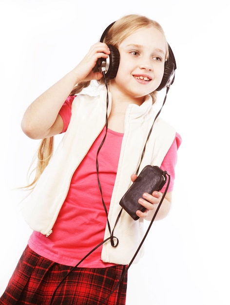 Dancing little girl headphones music singing on white background