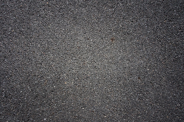 Dark black asphalt surface, background