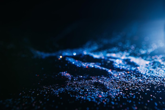 Dark and blue abstract glitter background Blizzard on cold planet surface concept