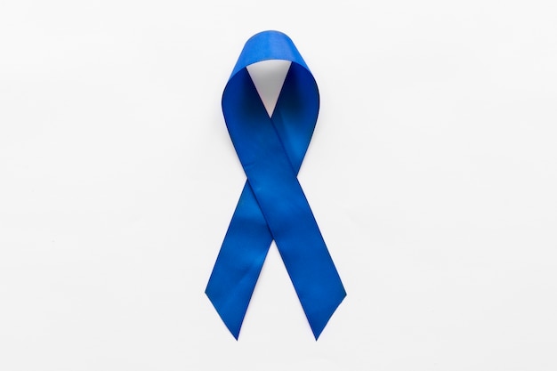 Dark blue awareness ribbon on white background