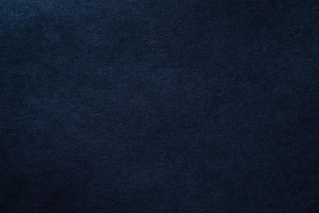 Dark blue felt texture abstract art background Solid color wool textile Copy space