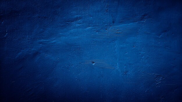 dark blue grungy abstract cement concrete wall texture background