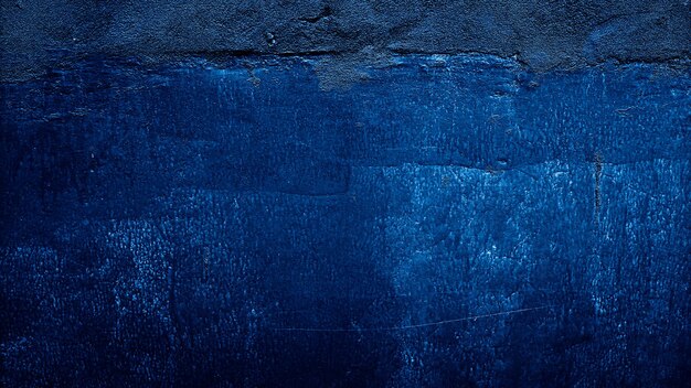 dark blue grungy abstract cement concrete wall texture background