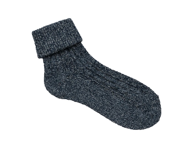 Dark blue knitted socks for cold weather insulated on a white background Minimal footwear concept