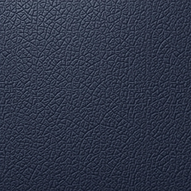 Photo a dark blue leather background with a pattern of small dots and a small curved design