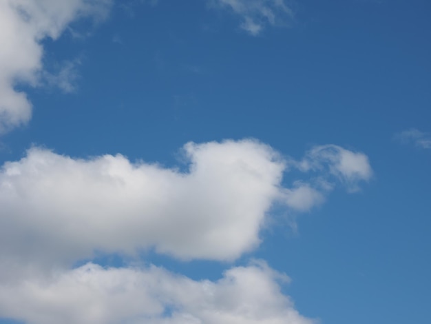 Dark blue sky with clouds background