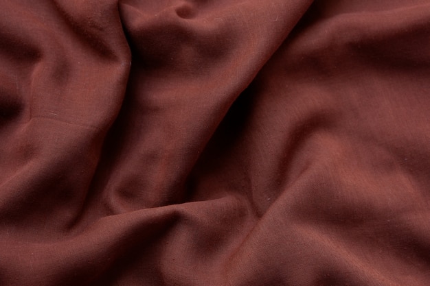 Dark brown cloth background texture, close-up of beautiful dark brown cloth for wallpaper