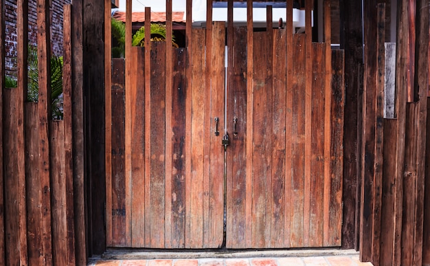 Dark Brown colored natural textured wood panel for wooden fence or wall board background