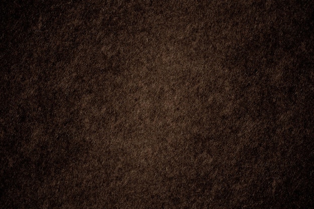 Dark brown seamless rough texture background