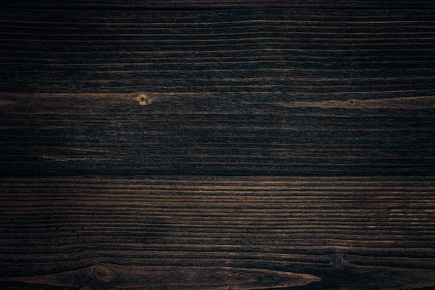 Dark brown wood texture with natural striped background 