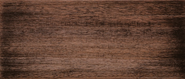 Dark brown wooden texture background.