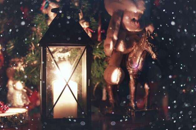 Dark candle lantern holiday snow fairy