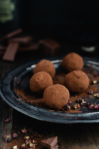 Dark chocolate candy truffles with sichuan pepper