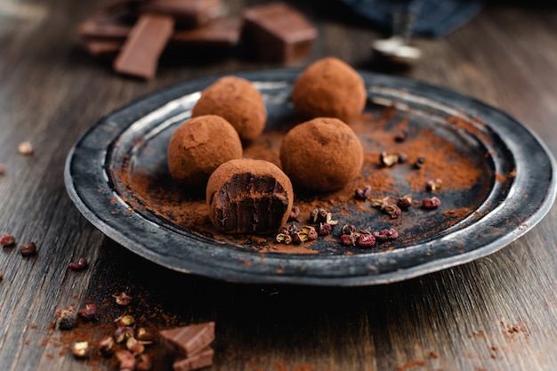 Dark chocolate candy truffles with sichuan pepper