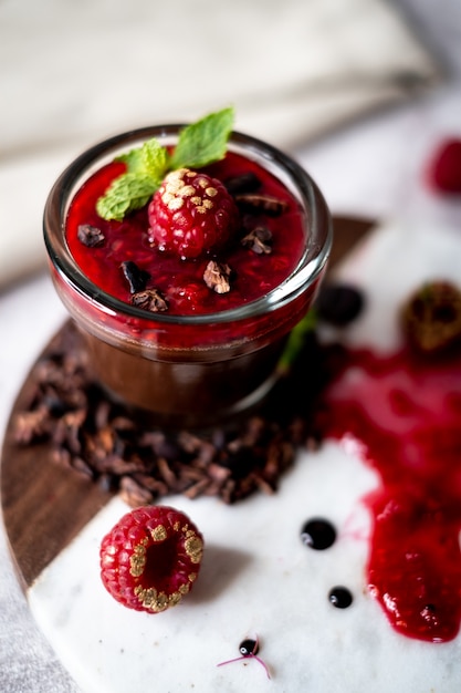 Dark Chocolate Mousse Pudding with Raspberries.