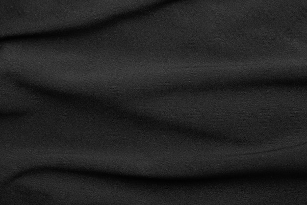 Photo dark fabric background closeup