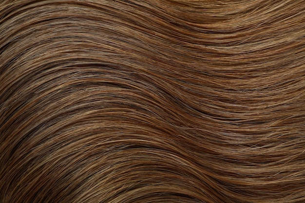 Dark female hair on whole background, close up