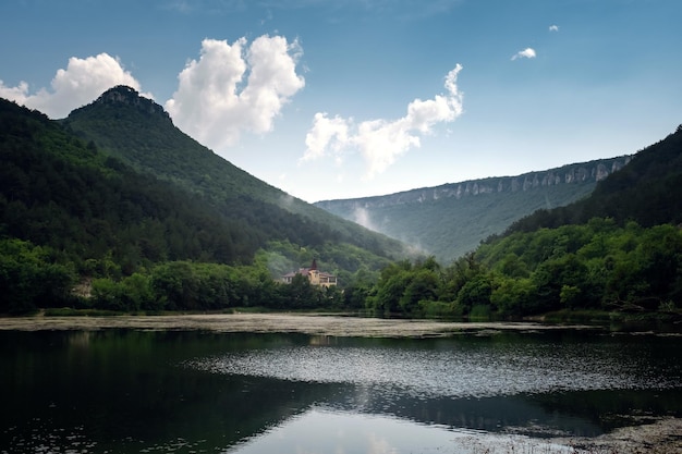 Dark and Foggy lake with hills after the rain