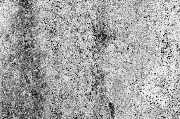 Dark gray seamless grunge textured rough concrete wall surface for background