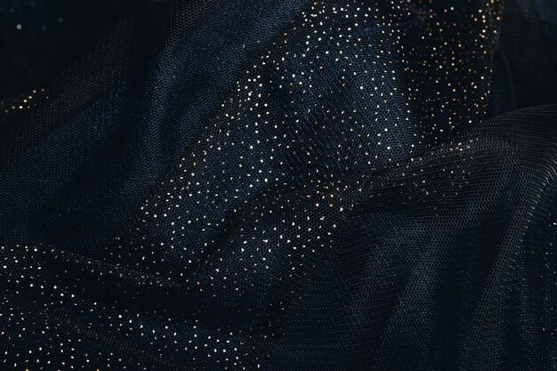 Dark green fabric with sequins