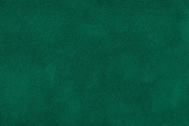 Dark green matt suede fabric  Velvet texture,