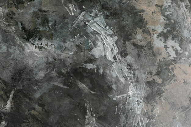 Dark grey grunge plaster textured wall closeup